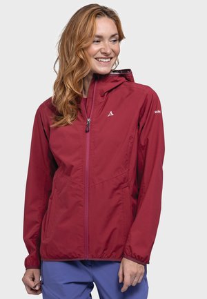 Red lightweight jacket with a zip front, hood, and elastic cuffs. Features a logo on the left shoulder and side pockets.