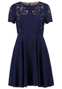Navy blue dress with short sleeves, lace cutouts, fitted bodice, and flared skirt. Smooth fabric with a zip closure at the back.