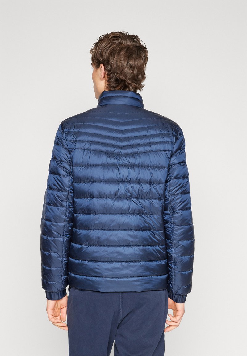 BOSS BOTTLED UNITED 100ML POUR HOMME