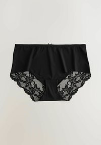 Svarta högmidjade trosor med en slät framsida, spetsdetaljer på sidorna och en vågig kant, med en liten rosett i midjebandet.
