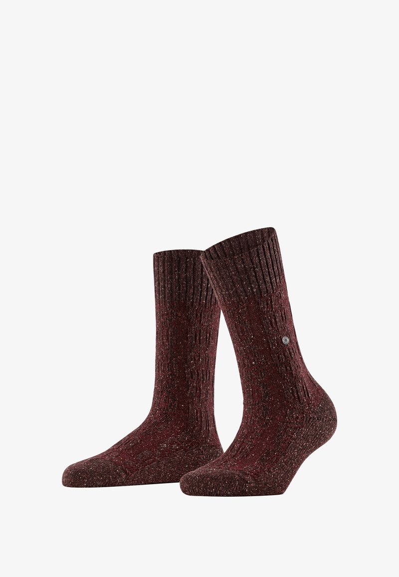Skarpetki do kolan wykonane z mieszanki wełny w kolorze burgundowym, z prążkowaną teksturą i srebrnym akcentem z logo po boku. Miękka i wytrzymała konstrukcja.