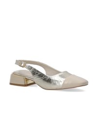 Beige and gold slingback shoe with a low block heel and pointed toe, featuring metallic accents and an adjustable strap.