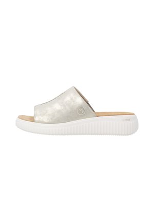 Silver slip-on sandal with wide upper, cushioned tan insole, and thick white ridged sole designed for comfort and casual wear.