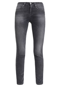 Jeans ajustados en denim gris oscuro, con un diseño clásico de cinco bolsillos, un desvanecimiento sutil y una textura suave con un ligero estiramiento.