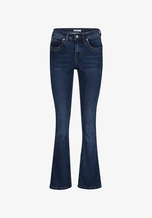 Mørkeblå, flagrende jeans lavet af denim, med fem lommer, lynlåslukning og diskret slid på forsiden, samt syede detaljer.