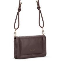 Brown faux leather crossbody bag with a rectangular shape, gold-tone hardware, logo detail on the front, and a textured strap.