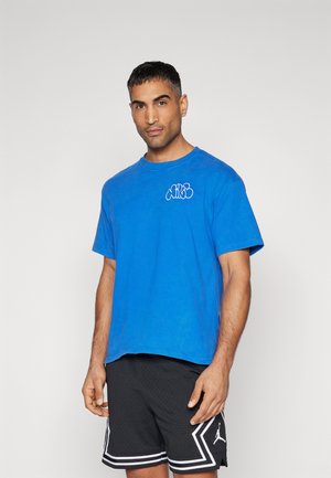 Nike Performance TEE NAOS - Print T-shirt - game royal
