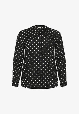 Svart långärmad blus med vita prickar, V-ringning och knappdetaljer längs knäppningen. Mjuk, strukturerad tyg.