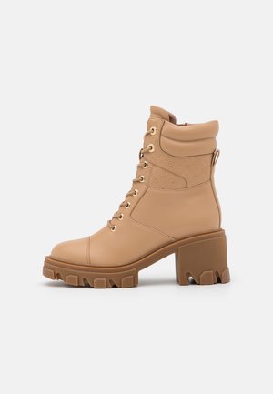 Bottines à plateau - beige