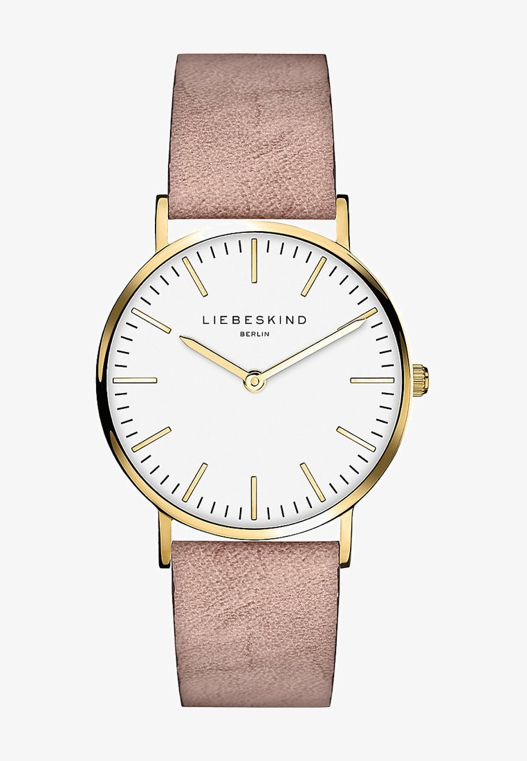 Runde Uhr mit einem weißen Ziffernblatt, goldenen Akzenten und schlanken Stundenmarkierungen. Verfügt über ein hellrosa Lederarmband und ein minimalistisches Design.