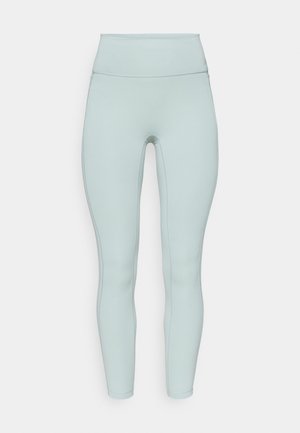 Leggings bleu clair en tissu extensible avec une taille haute, une texture lisse et sans motifs ni ornements visibles.