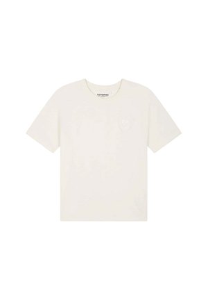 Camiseta de algodón de manga corta en color blanco hueso con escote redondo y logo sutil en relieve en el pecho izquierdo.