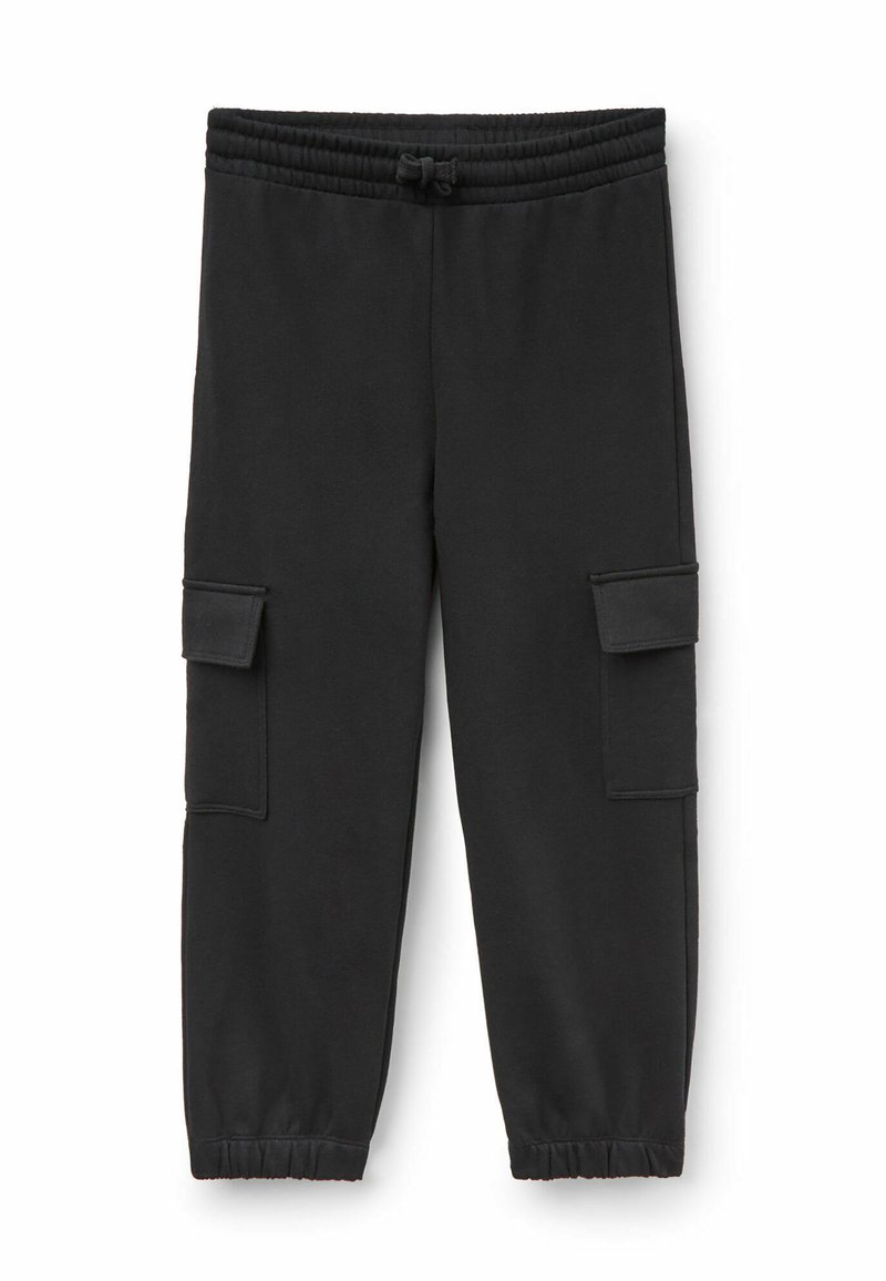 Schwarze Sweatpants aus weichem Material, mit elastischem Bund, Kordelzug und zwei seitlichen Cargo-Taschen. Mit Bündchen an den Knöcheln.
