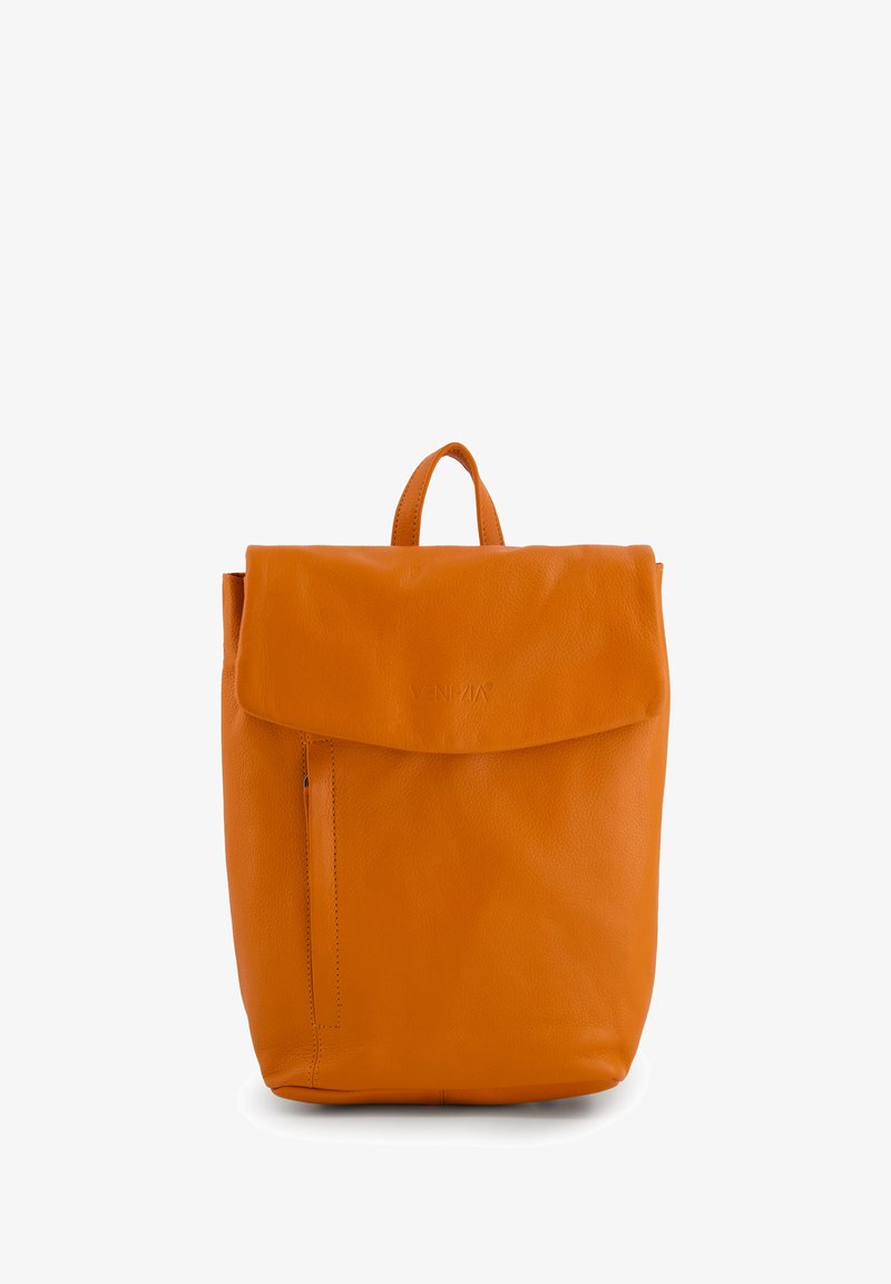 Orange leather backpack with a fold-over flap, front pocket, top handle, and smooth texture. Features subtle branding on the flap.