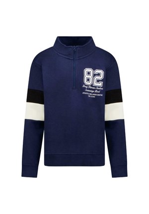 Marineblauwe sweatvest met kwartrits, voorzien van zwart-witte mouwstrepen en een wit nummer "82" met fitness-gerelateerde tekst op de borst.