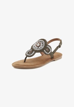 Olivgrüne Sandalen mit einer dekorativen Perlenverzierung, schlankem Knöchelriemen und einer flachen, nudefarbenen Fußbett. Weicher Wildleder-Textur mit detaillierten Mustern.