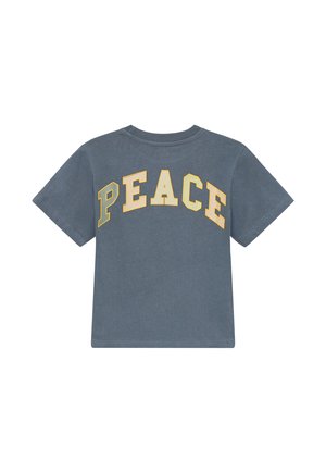 T-shirt en coton gris avec le mot "PAIX" en lettres majuscules jaunes au dos. Manches courtes et col rond.