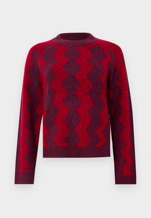 Pull en laine rouge et violet foncé avec un motif en zigzag, col rond, manches longues et poignets et ourlet côtelés.