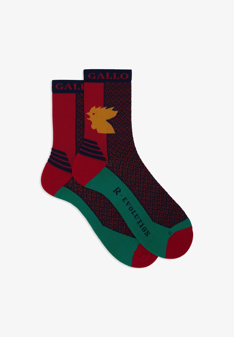Rote und marineblaue Socken mit einem Diamantmuster, das ein gelbes Vogelmotiv zeigt, grüne Akzente am Fuß und "GALLO"-Branding am Bund.