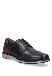 Marineblaue Leder-Dressschuhe mit braunen Akzenten, Broguedetails und abgerundeter Zehenpartie. Besitzt eine graue Gummisohle und ein traditionelles Schnürdesign.