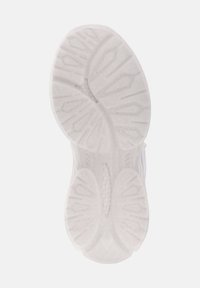 Schu leider mit einer strukturierten weißen Gummisohle, die hexagonale und winklige Muster für Halt und Traktion aufweist.