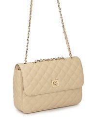 Beigenvärinen tikattu käsilaukku metallinen kultainen ketjuhihna, jossa on napsautettava suljin ja etuosassa logokoriste.