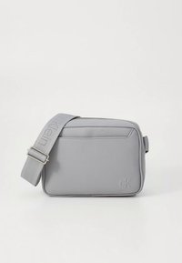 Light grey rectangular crossbody bag made of textured material; features a front zipper pocket and a fabric strap with logo detailing.