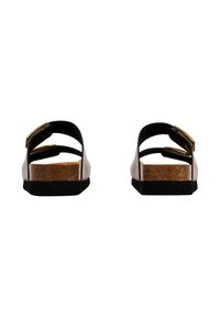 Sandali neri con due cinturini regolabili, una soletta in sughero e una suola nera texturizzata. Dettagli in tonalità oro sui cinturini.
