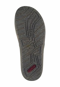 Rubber shoe sole with textured, wavy pattern. Color is dark grey with faint natural accents. Features brand logo in red. Size marked as 41.