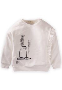 Bijela dukserica s crnim konturama printane posude s biljkom. Ruffles detalji sa jedne strane dodaju teksturu. Mješavina pamuka.
