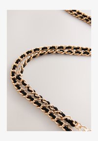 Ej vald, black gold tone