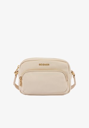 Bež torbica čez ramo iz gladkega materiala z zlatim okovjem, dvema žepoma z zadrgo in nastavljivim trakom. Na sprednji strani je logotip blagovne znamke.