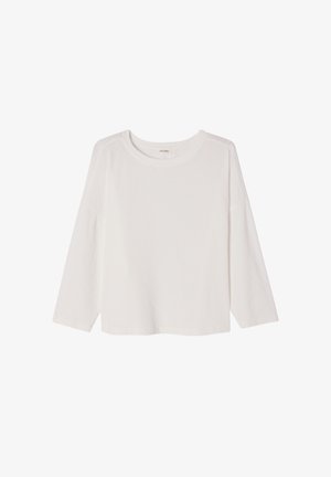 White long-sleeve ribbed knit top with round neckline and slightly loose fit, displayed flat on a white background.
