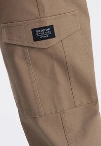 WITH POCKETS  - Cargohose - light brown