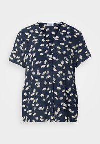 Blusa blu Navy a maniche corte, con scollatura a V, caratterizzata da una stampa di margherite in bianco e giallo. Realizzata in tessuto morbido con una vestibilità comoda.