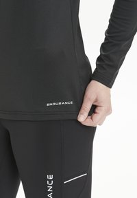 Endurance MIDLAYER TUSINA - Pitkähihainen paita - black