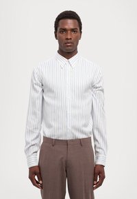 Michael Kors LIGHT TRAVEL PANT - Ülikonnapüksid - frosted brown