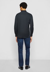 Tommy Hilfiger CORE FLEX REGULAR FIT - Skjorter - black