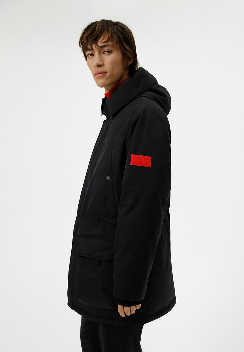 Herren Trenchcoats | HUGO MELMUS Parka black/schwarz - ZV03291 Herren Trenchcoats | HUGO MELMUS Parka black/schwarz - ZV03291