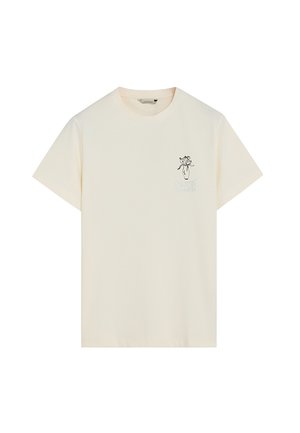 Camiseta de manga corta color crema con cuello redondo y pequeño dibujo lineal negro de un jarrón con flores en el pecho izquierdo.