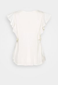 Vit t-shirt med kort ärm och volangärmar samt spetsdetaljer. Samlade sidor ger textur till den lösa, avslappnade passformen.