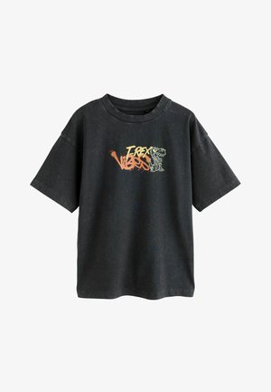 Melns lielizmēra T-krekls ar īsām piedurknēm, ar krāsainu grafiku "T-Rex Vibes". Izgatavots no kokvilnas auduma ar teksturētu apdari.