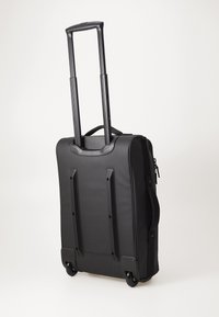Black wheeled carry-on suitcase with extendable handle, smooth texture, two wheels, and a zippered compartment on the side.