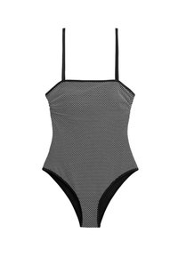 Čierno-biele jednodielne plavky s bodkami, tenkými ramienkami a rovnakým výstrihom na bielom pozadí.