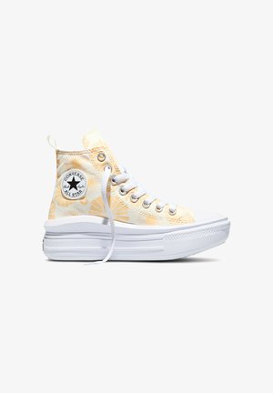 Baskets montantes Converse blanches avec motifs jaunes en forme de rayons de soleil, lacets blancs, semelle blanche épaisse et logo Converse All Star à la cheville.