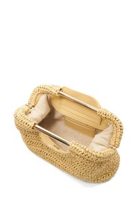 Woven straw handbag in beige with a smooth leather interior. Features metallic handles and a spacious open compartment.