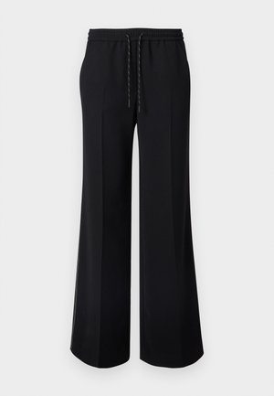 Schwarze, weite Hosen mit elastischem Bund und Kordelzug. Glatter Stoff mit seitlichen Schlitzen für zusätzliche Belüftung. Einfaches, minimalistisches Design.