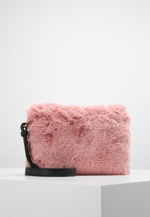 Soft pink rectangular faux fur clutch with black leather wrist strap, displayed on white pedestal against plain background.
