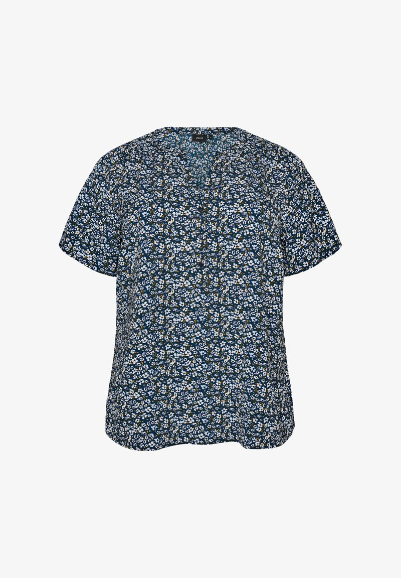 Blouse bleu marine à manches courtes avec un motif floral blanc et jaune partout, et un col en V.