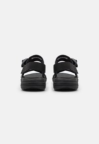 Merrell DISTRICT 4 BACKSTRAP - Käimissandaalid - black